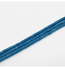 Нить турквенит тонированный голубой цилиндр 8*14мм
