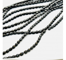 Нить гематит черный овал грань 6*9мм