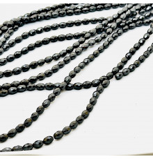 Нить гематит черный овал грань 6*9мм