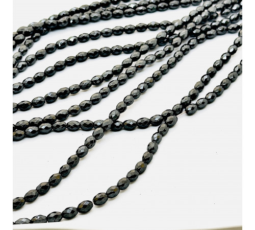 Нить гематит черный овал грань 6*9мм