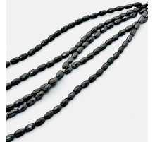 Нить гематит черный овал грань 6*11мм