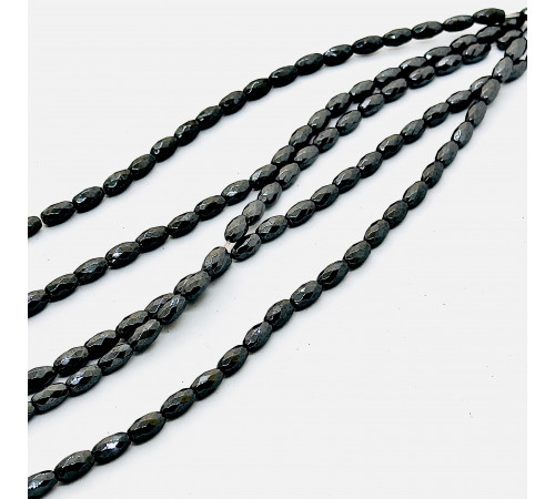 Нить гематит черный овал грань 6*11мм