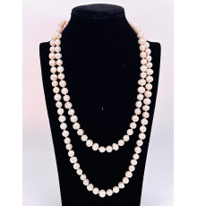 Бусы пресноводный жемчуг персиковый 9*11мм