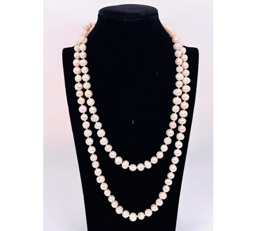 Бусы пресноводный жемчуг персиковый 9*11мм