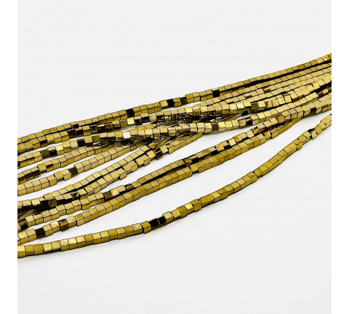 Нить гематит темно золотой куб 4*4мм